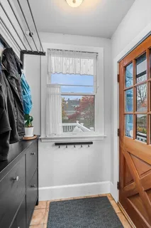 a view of a room with window and cabinet