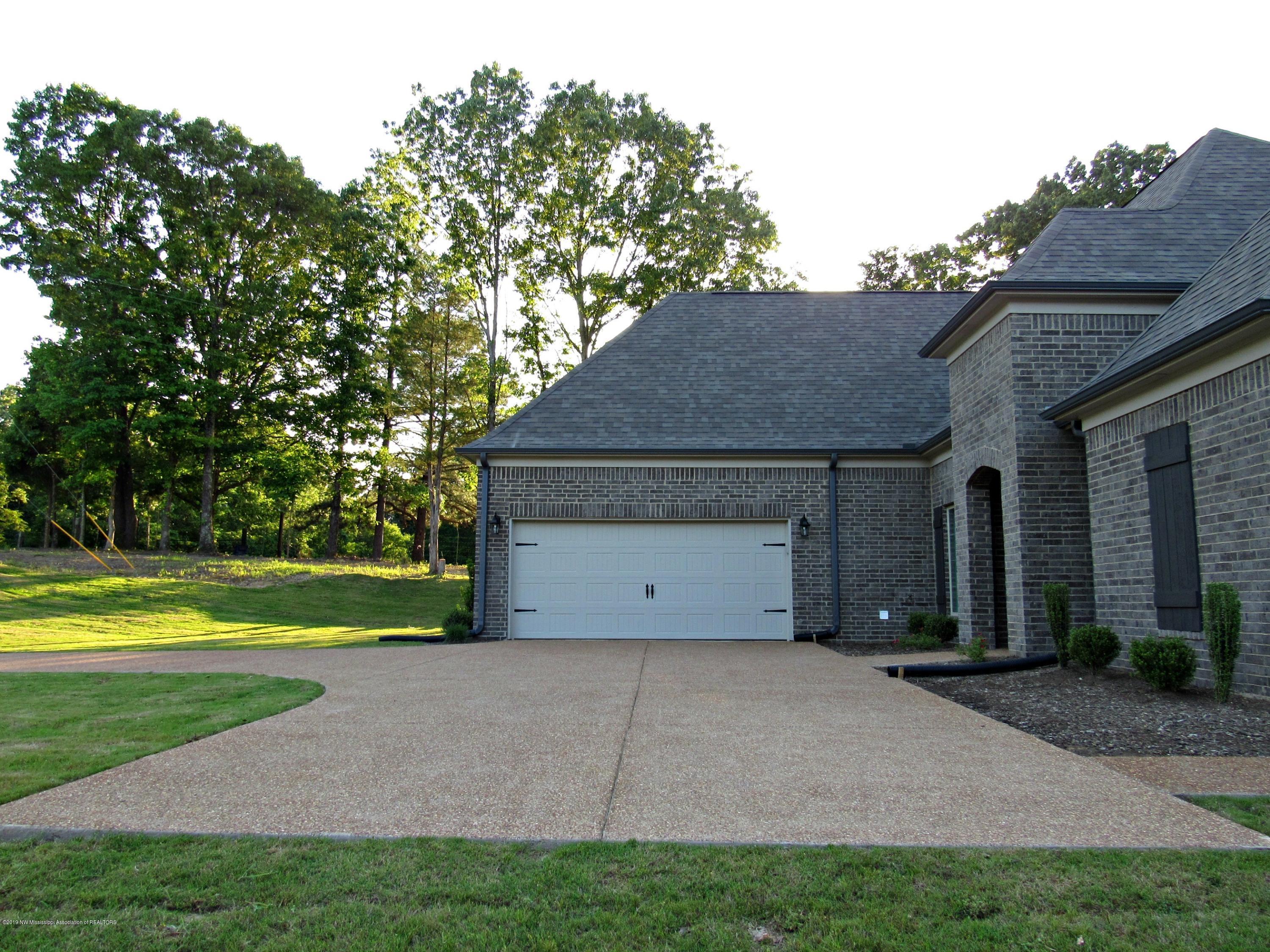 2302 Pine Tree Road Hernando, MS 38632 - Photo 4 of 41 exterior concrete parking pad