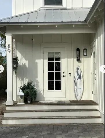 a view of a entryway door front of a house