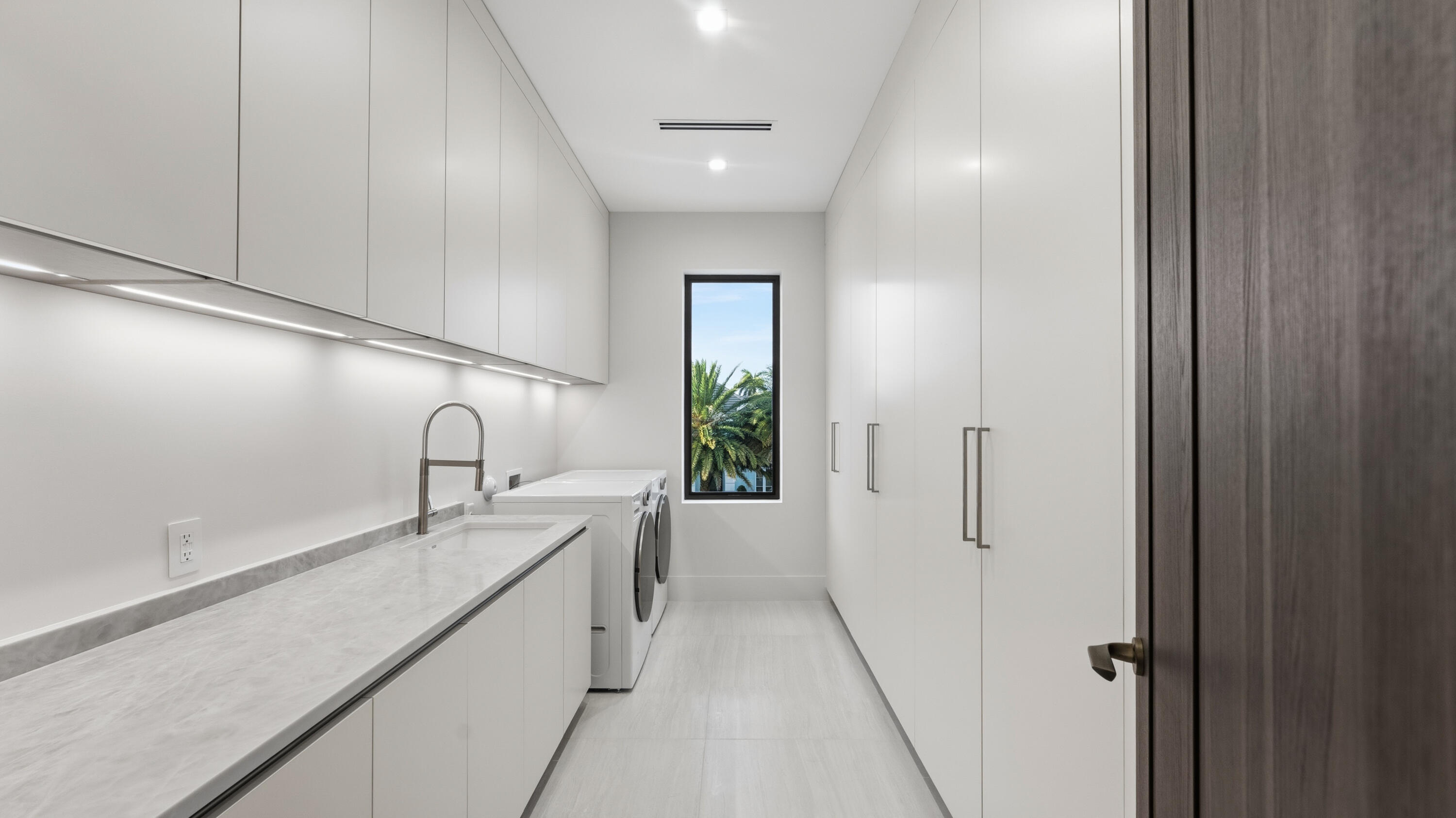 274 Northeast 3rd Court Boca Raton, FL 33432 - Photo 51 of 59 LAUNDRY ROOM UPSTAIRS