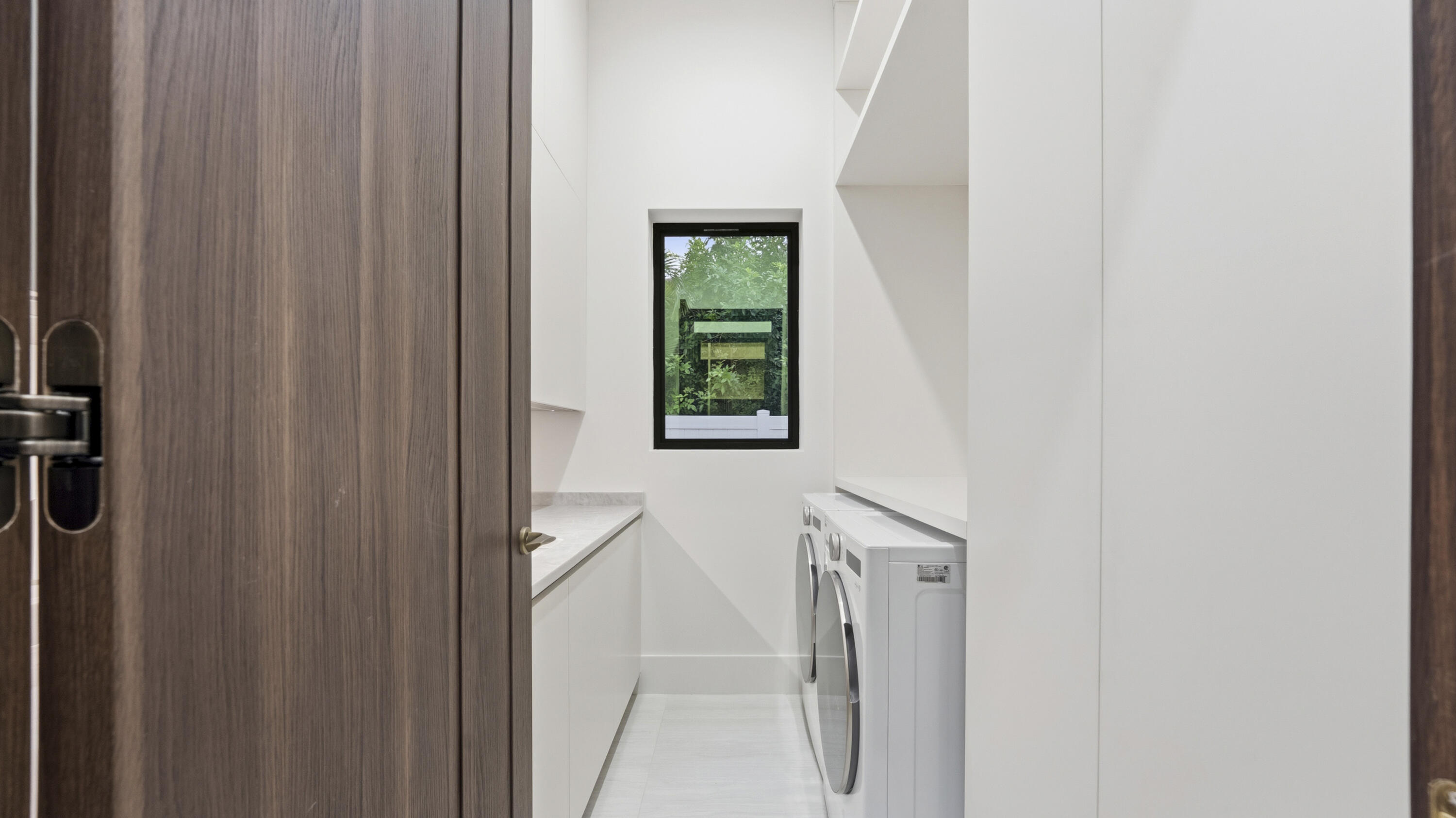 274 Northeast 3rd Court Boca Raton, FL 33432 - Photo 52 of 59 LAUNDRY ROOM DOWNSTAIRS