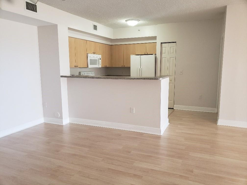 7920 North Nob Hill Road, Unit 104 Tamarac, FL 33321 - Photo 2 of 19 Photo 2