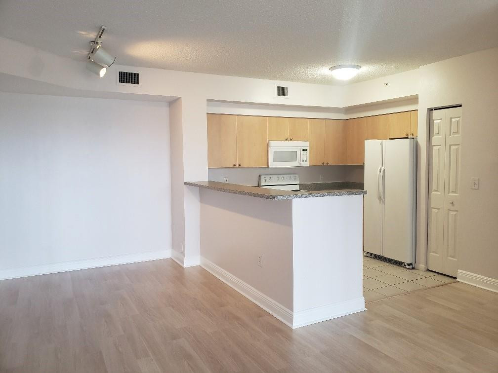 7920 North Nob Hill Road, Unit 104 Tamarac, FL 33321 - Photo 3 of 19 Photo 3