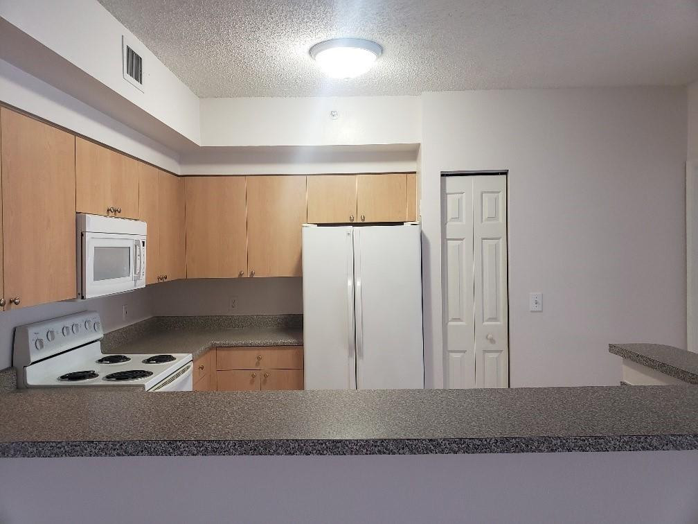7920 North Nob Hill Road, Unit 104 Tamarac, FL 33321 - Photo 9 of 19 Photo 9