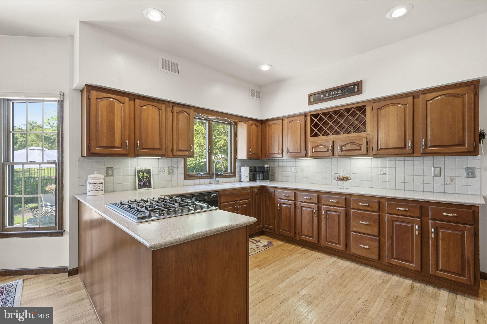26 Ellisdale Road Allentown, NJ 08501 - Photo 19 of 45 Warm wood tones in a bright kitchen.