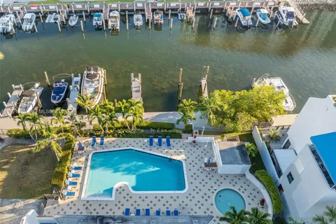 a view of multiple houses with a yard