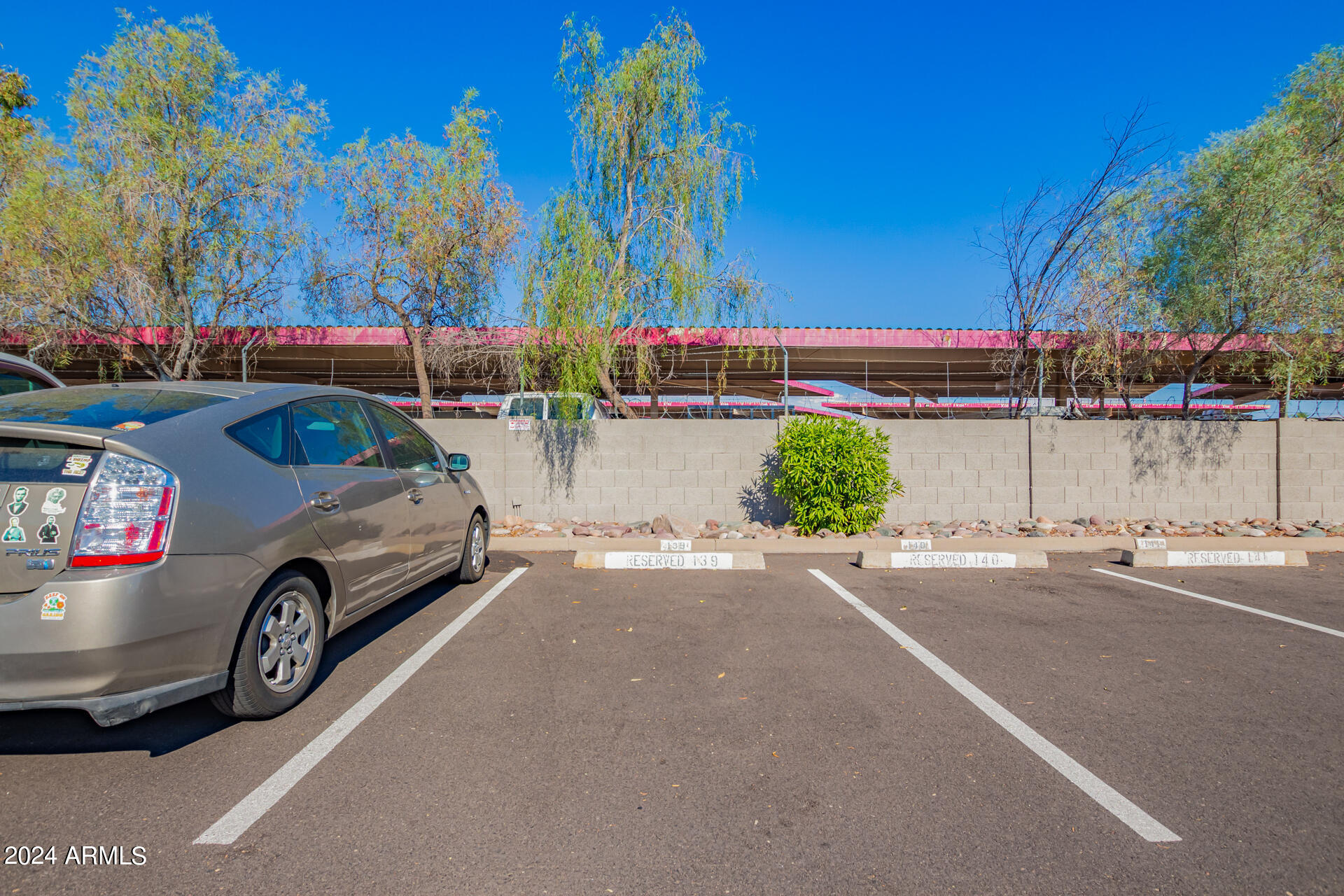 533 West Guadalupe Road, Unit 2046 Mesa, AZ 85210 - Photo 29 of 29 a car parked on the side of a road