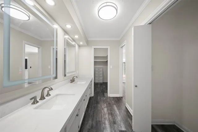 a view of a room with cabinet and air conditioner vent