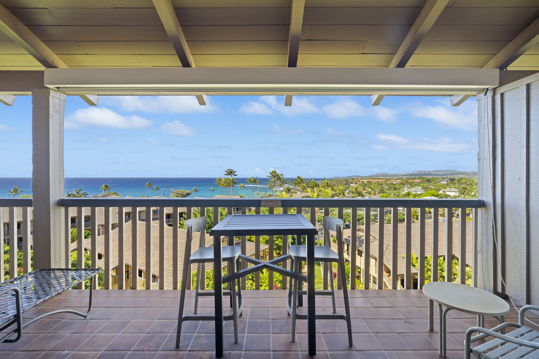 1870 Hoone Road, Unit 831 Koloa, HI 96756 - Photo 19 of 30 a view of a balcony with chairs