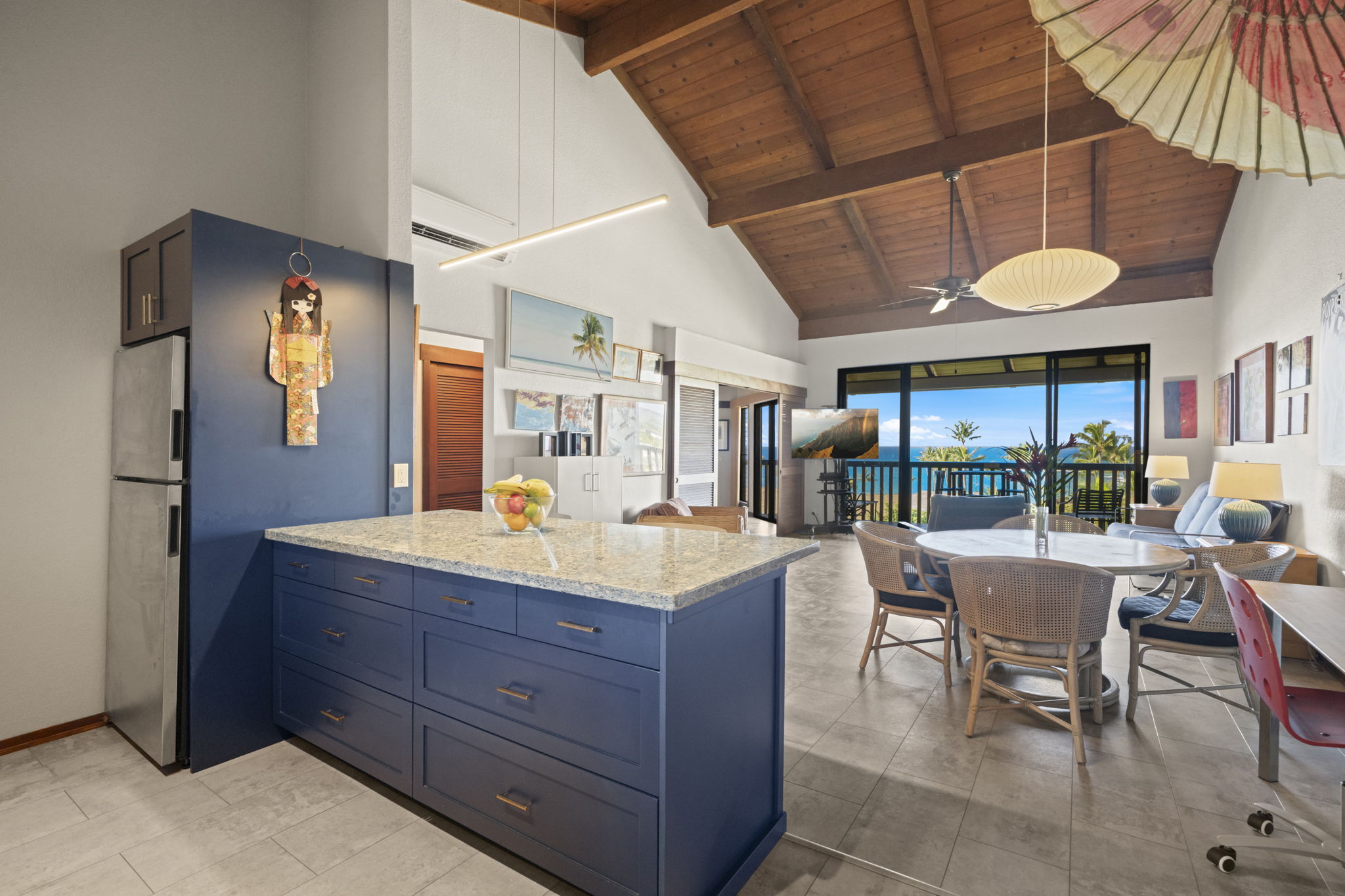 1870 Hoone Road, Unit 831 Koloa, HI 96756 - Photo 2 of 30 a room with lots of table and chairs