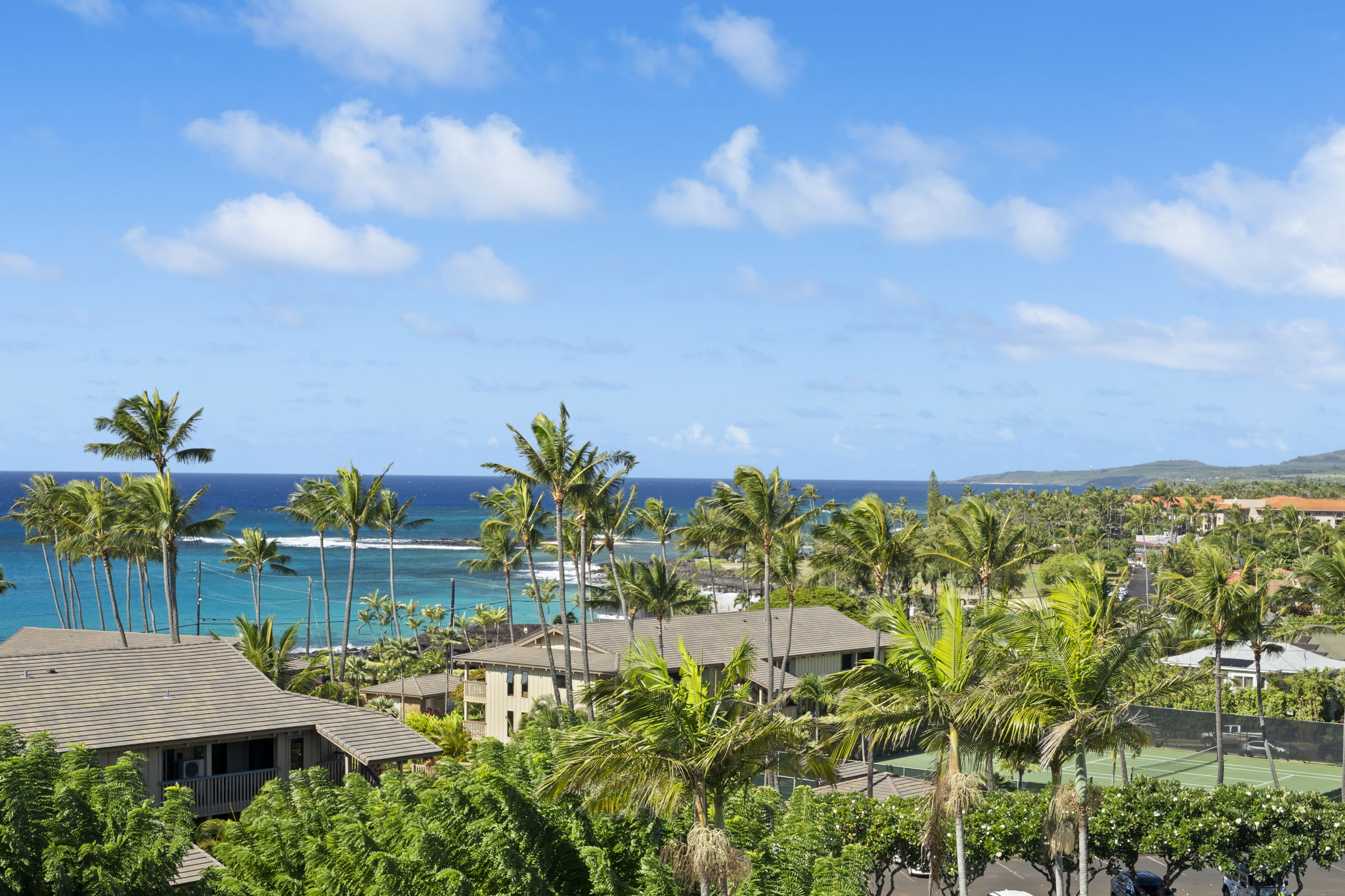 1870 Hoone Road, Unit 831 Koloa, HI 96756 - Photo 21 of 30 a view of a swimming pool with a yard