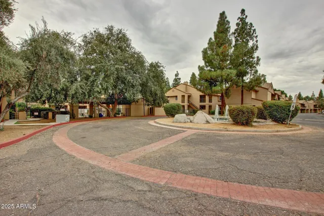 a view of a house with basketball court