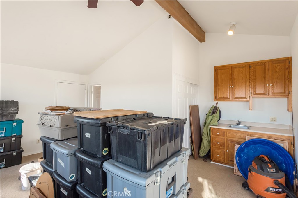 711 Tumble Creek Lane Fallbrook, CA 92028 - Photo 30 of 66 Bedroom 4/ADU. Kitchenette to the right has sink but would need microwave, hotplate, small refrigerator, etc. Bathroom is through the door in the back of photo.