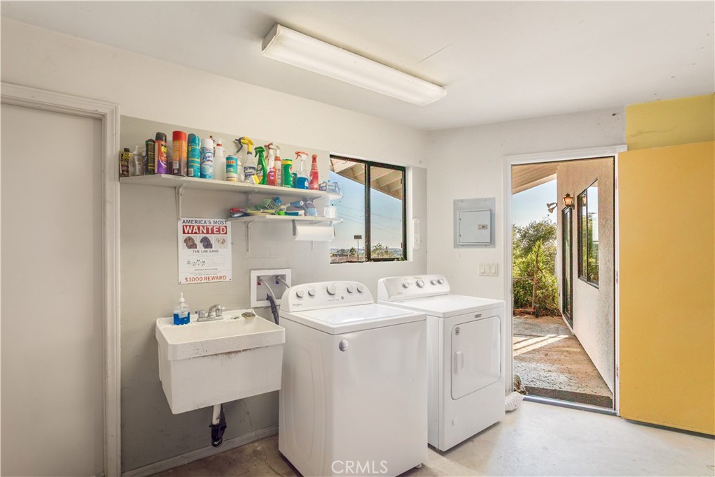 711 Tumble Creek Lane Fallbrook, CA 92028 - Photo 33 of 66 Garage has laundry hookups, sink and toilet (not shown.)