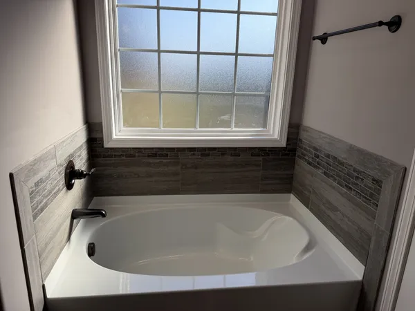 a bathroom with a bathtub