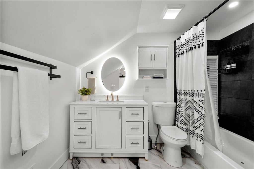 285 Patterson Avenue Bridgeville, PA 15017 - Photo 17 of 33 Full bath located upstairs off bedroom 2. LED mirror and new vanity.