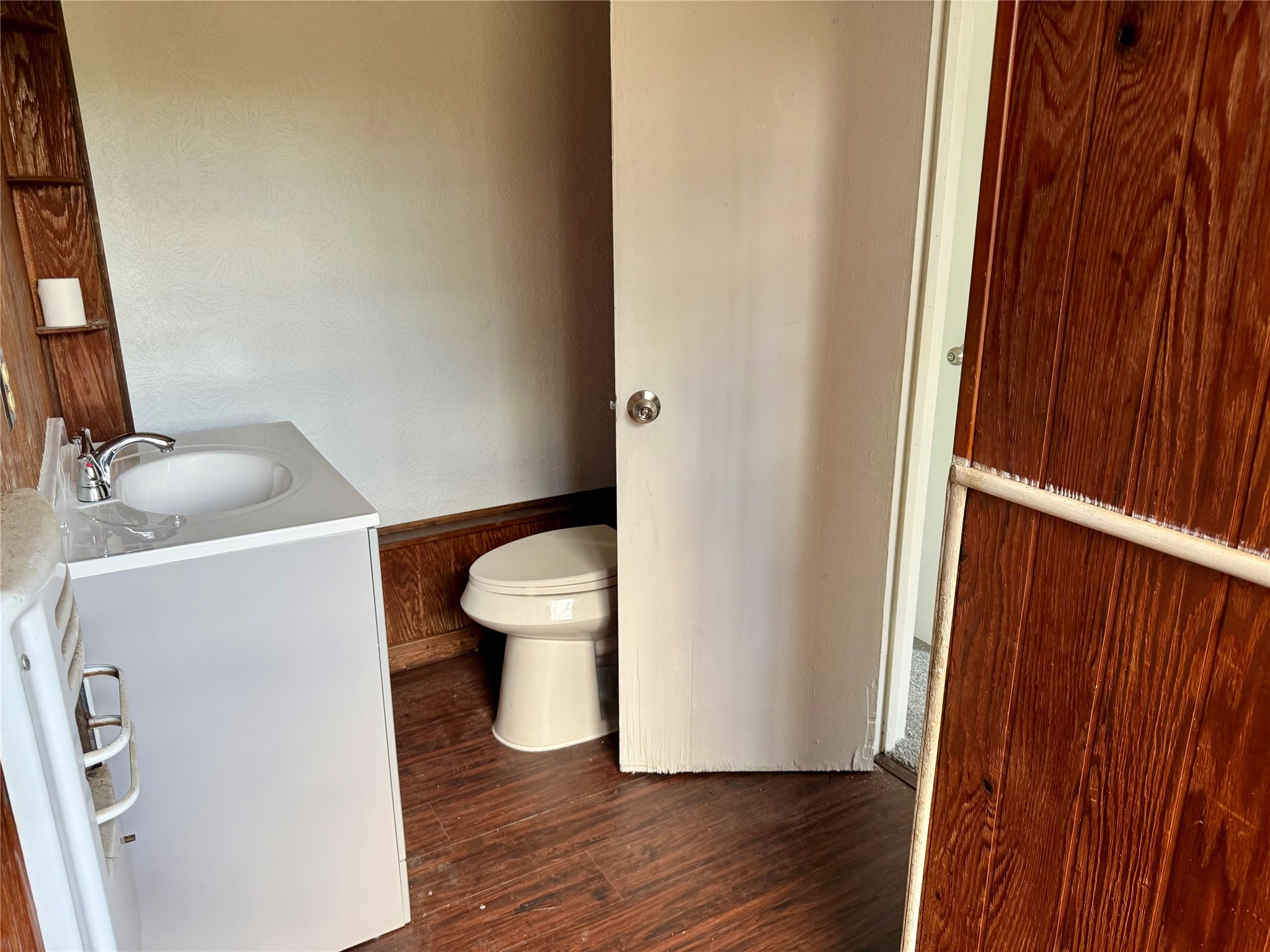 5326 Wenda Street Houston, TX 77033 - Photo 3 of 9 a white toilet sitting next to a sink