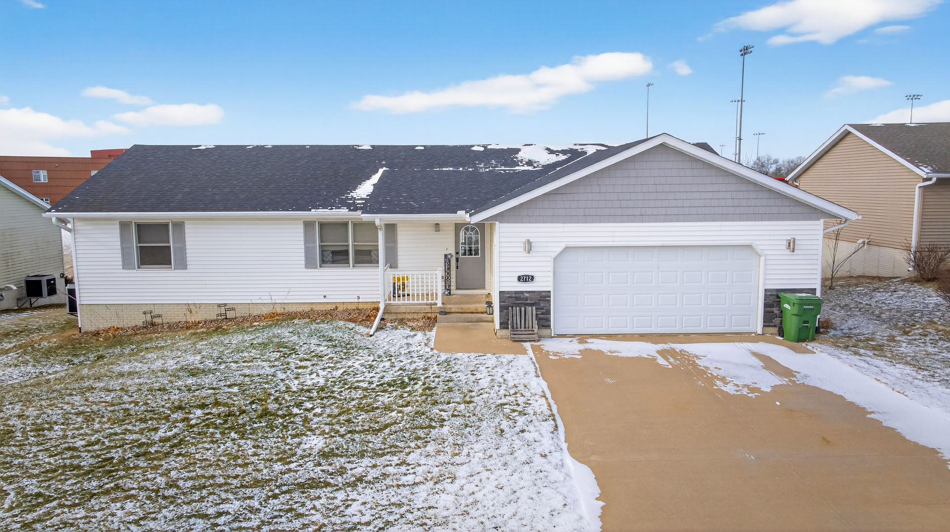 2712 North 13th Street Clinton, IA 52732 - Photo 2 of 47 a front view of a house with a yard and garage