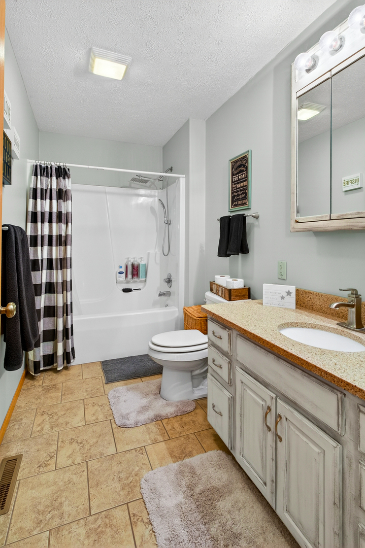2712 North 13th Street Clinton, IA 52732 - Photo 27 of 47 a spacious bathroom with a sink toilet and shower