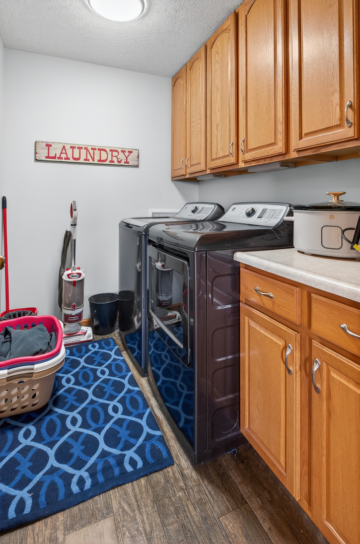 2712 North 13th Street Clinton, IA 52732 - Photo 32 of 47 a kitchen with a stove and cabinets