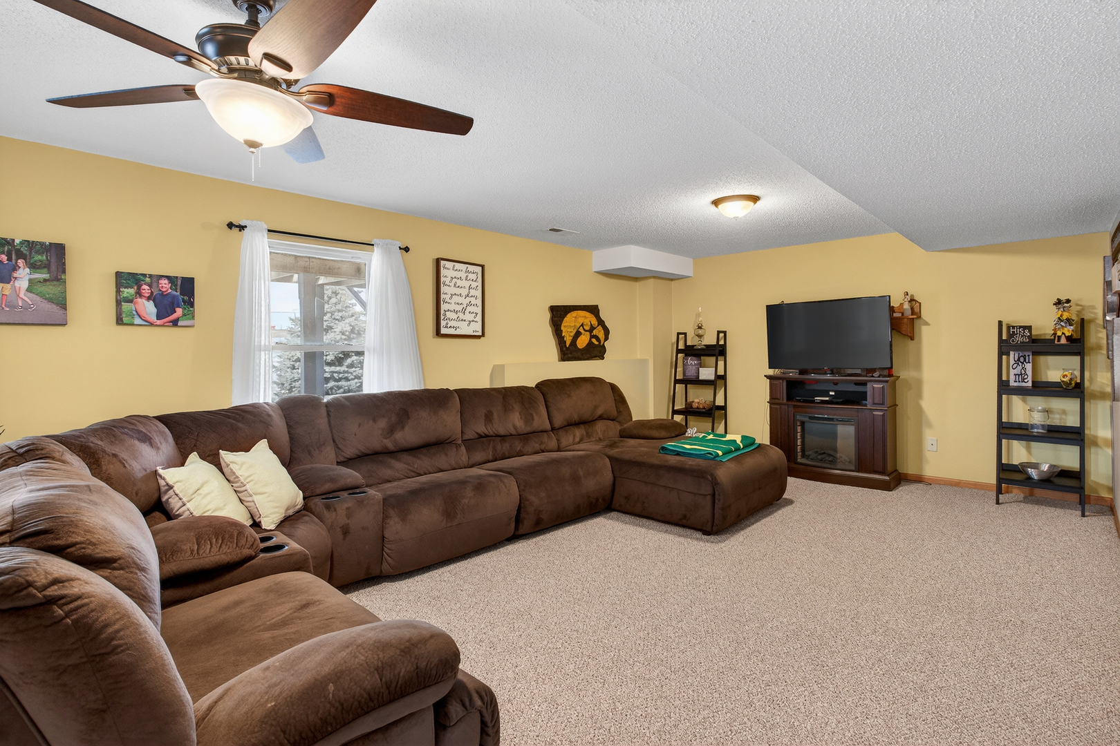 2712 North 13th Street Clinton, IA 52732 - Photo 39 of 47 a living room with furniture and a flat screen tv