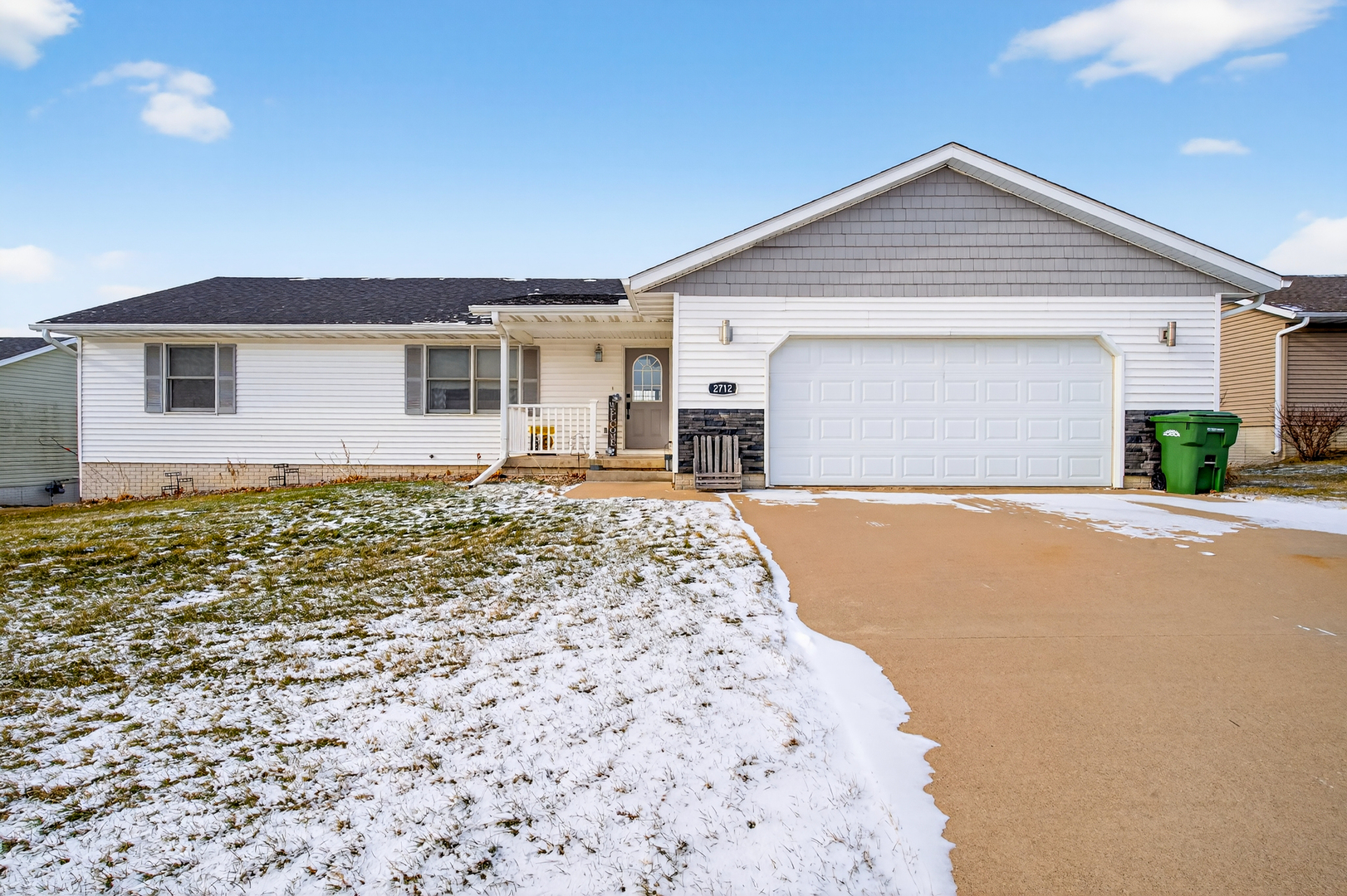 2712 North 13th Street Clinton, IA 52732 - Photo 44 of 47 a front view of a house with a yard and garage