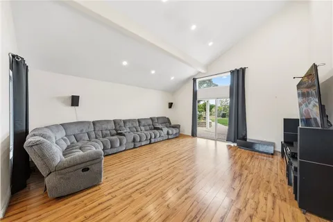 a view of entryway and dining room with chandelier