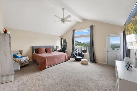 a view of a hallway with paintings on the wall