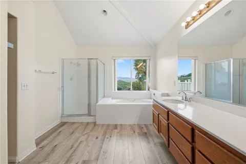 a view of a dirt road with mountain view