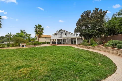a backyard of a house with lots of green space