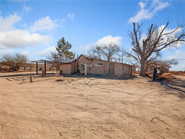 a view of large house with a yard