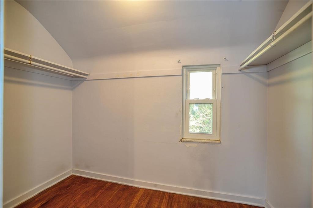 2381 Collins Road Pittsburgh, PA 15235 - Photo 15 of 20 a view of a small space with wooden floor and windows