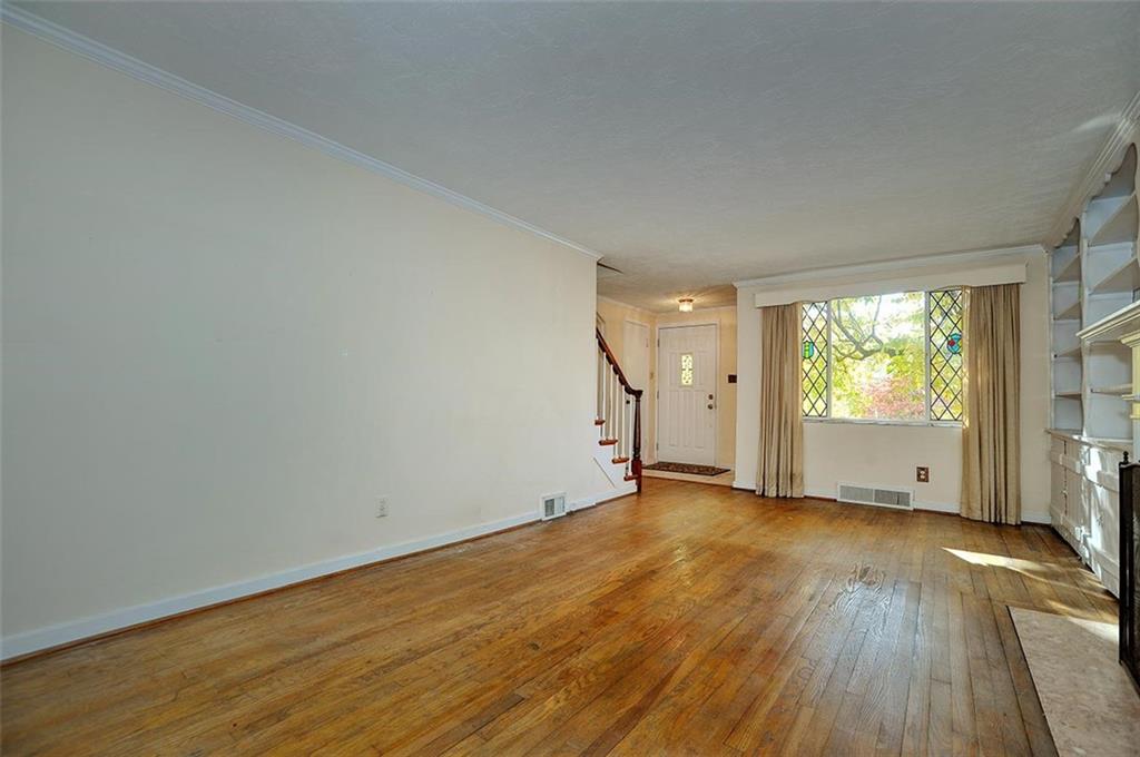 2381 Collins Road Pittsburgh, PA 15235 - Photo 5 of 20 an empty room with wooden floor and windows