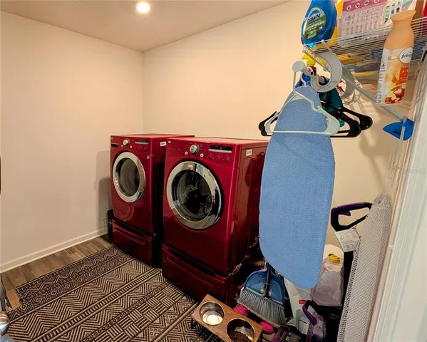 a utility room with dryer and washer