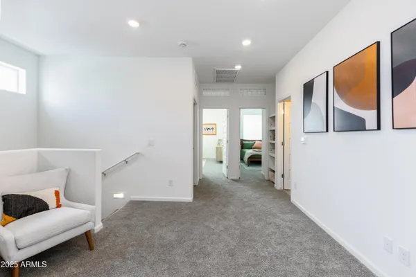 a view of a livingroom with furniture and cabinet