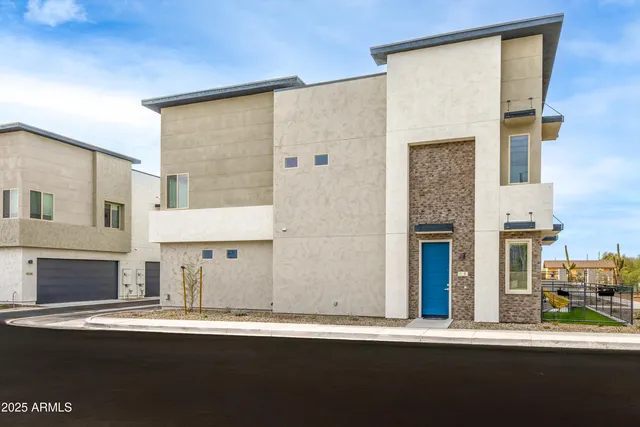 a front view of a building with street