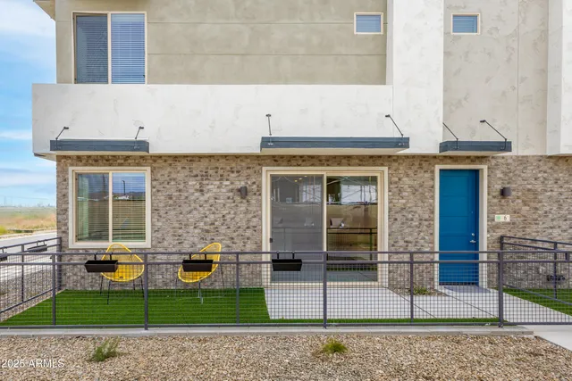 front view of a house with a patio