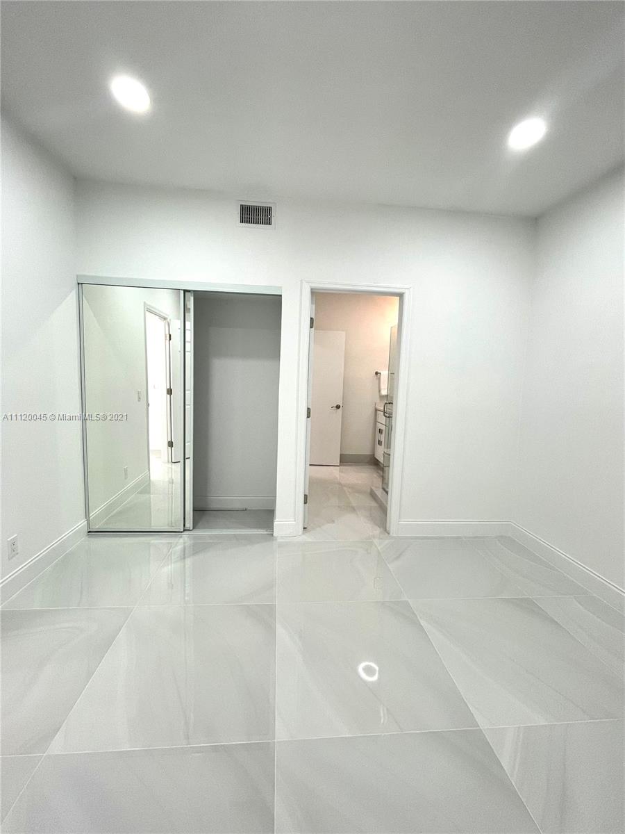 6726 Via Regina Boca Raton, FL 33433 - Photo 11 of 35 an empty room with a bathroom
