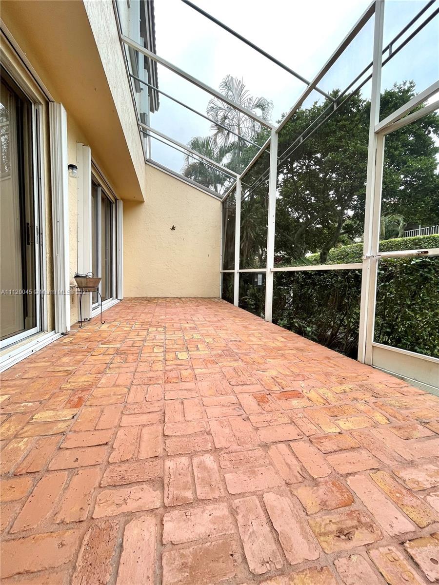 6726 Via Regina Boca Raton, FL 33433 - Photo 28 of 35 a view of a house with a snow in the yard