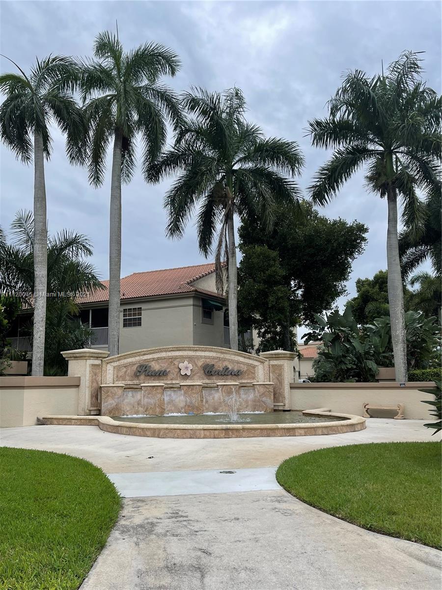 6726 Via Regina Boca Raton, FL 33433 - Photo 33 of 35 a view of a house with swimming pool and a sitting area