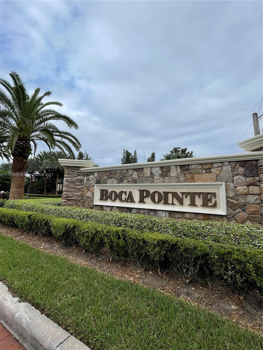 6726 Via Regina Boca Raton, FL 33433 - Photo 35 of 35 a view of a building with a yard