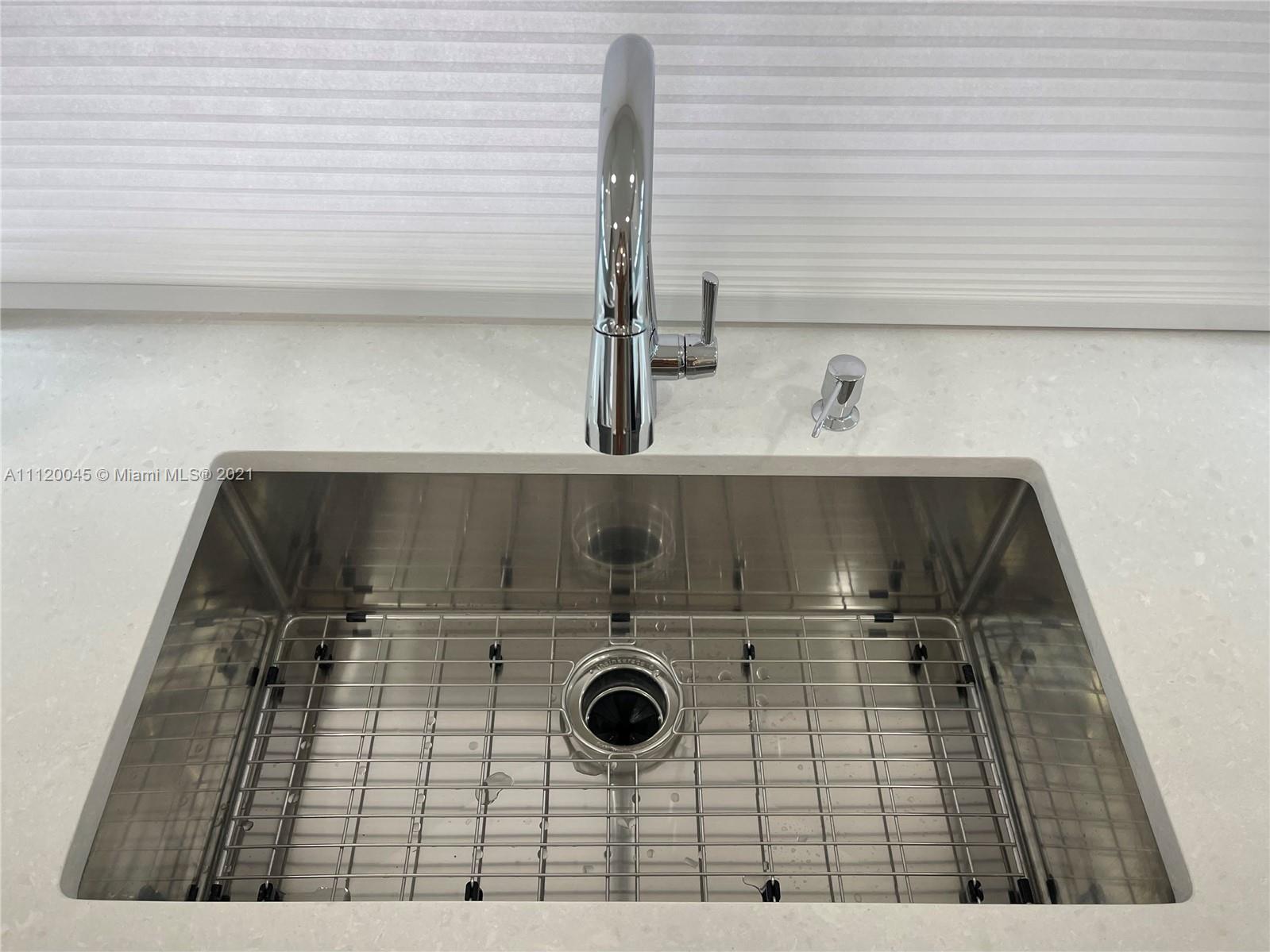 6726 Via Regina Boca Raton, FL 33433 - Photo 8 of 35 a close view of sink