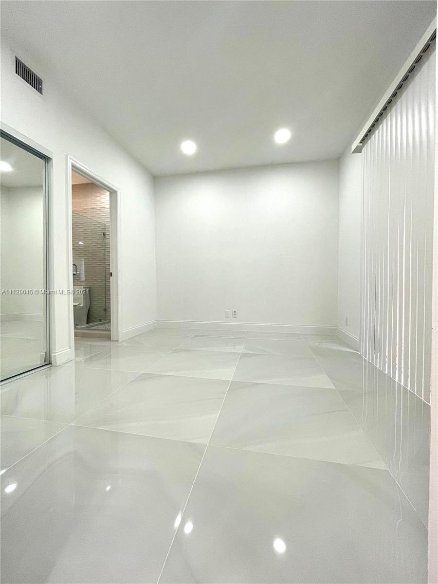 6726 Via Regina Boca Raton, FL 33433 - Photo 10 of 35 an empty room with a bathroom