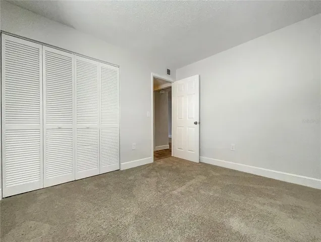 an empty room with closet