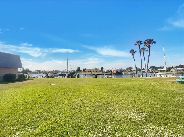 a view of swimming pool with a yard
