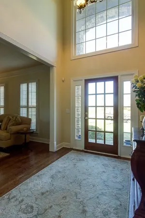 a view of livingroom with furniture and windows