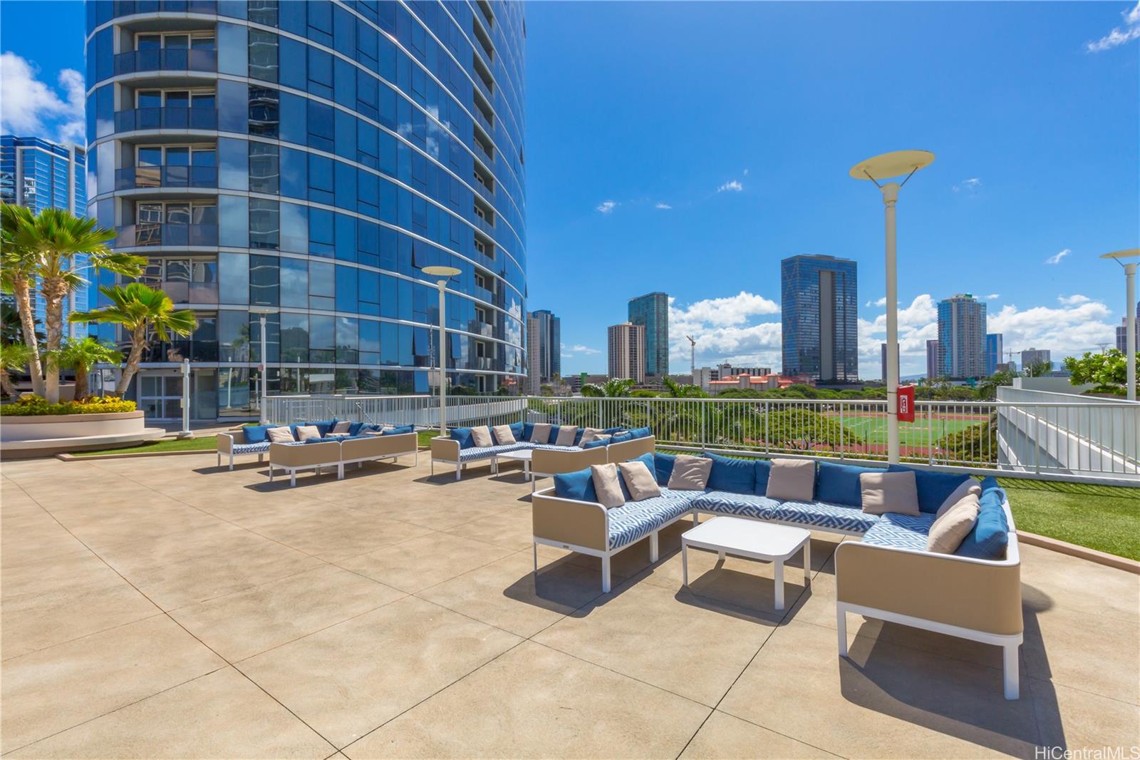 1288 Kapiolani Boulevard, Unit I4203 Honolulu, HI 96814 - Photo 19 of 25 a building outdoor space with patio furniture