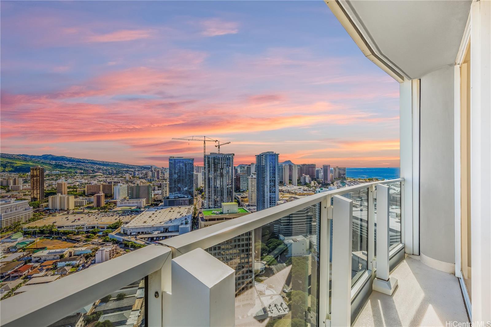 1288 Kapiolani Boulevard, Unit I4203 Honolulu, HI 96814 - Photo 7 of 25 a view of a city from a balcony
