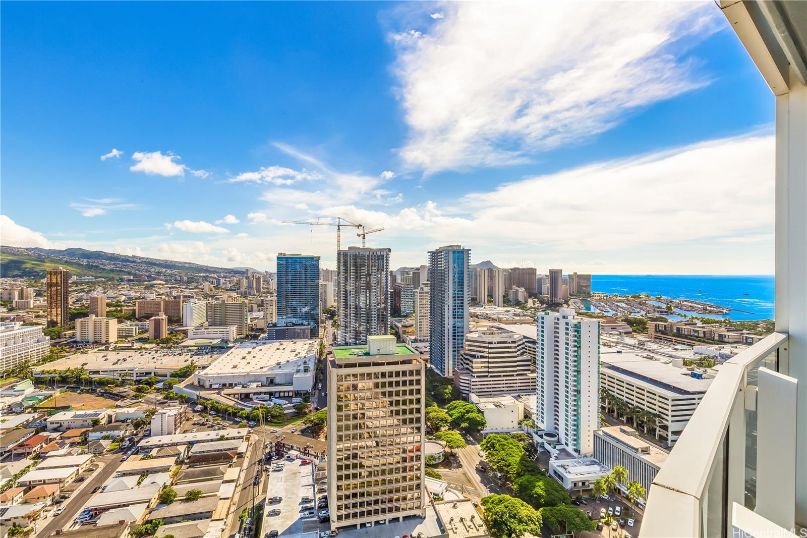 1288 Kapiolani Boulevard, Unit I4203 Honolulu, HI 96814 - Photo 8 of 25 a view of a city with tall buildings