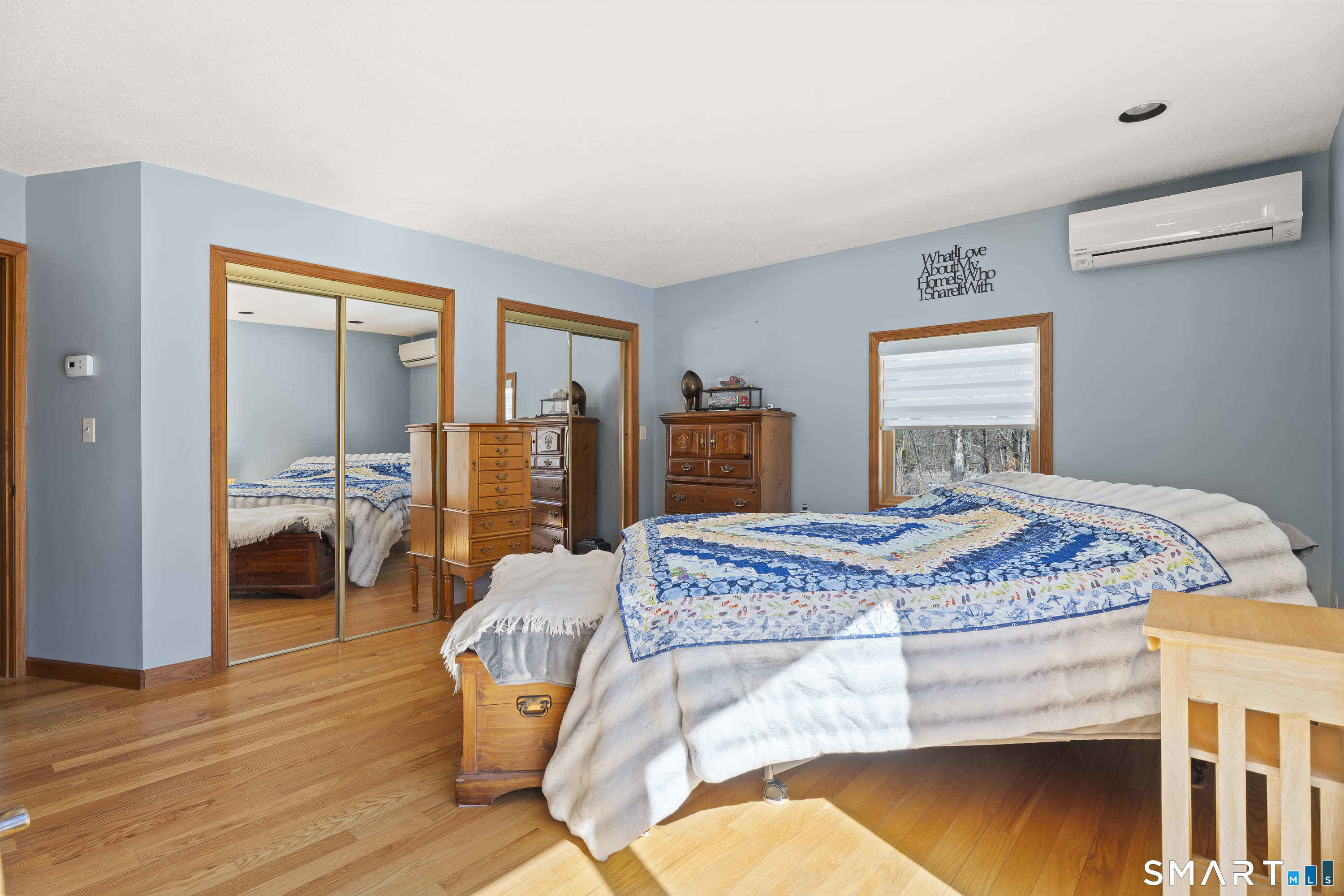 172 Old Willimantic Road Columbia, CT 06237 - Photo 12 of 39 a bedroom with a bed and wooden floor